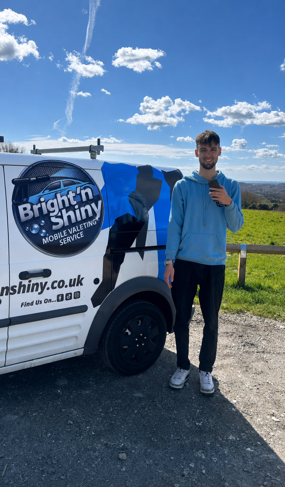 The course instructor standing beside his mobile valeting van